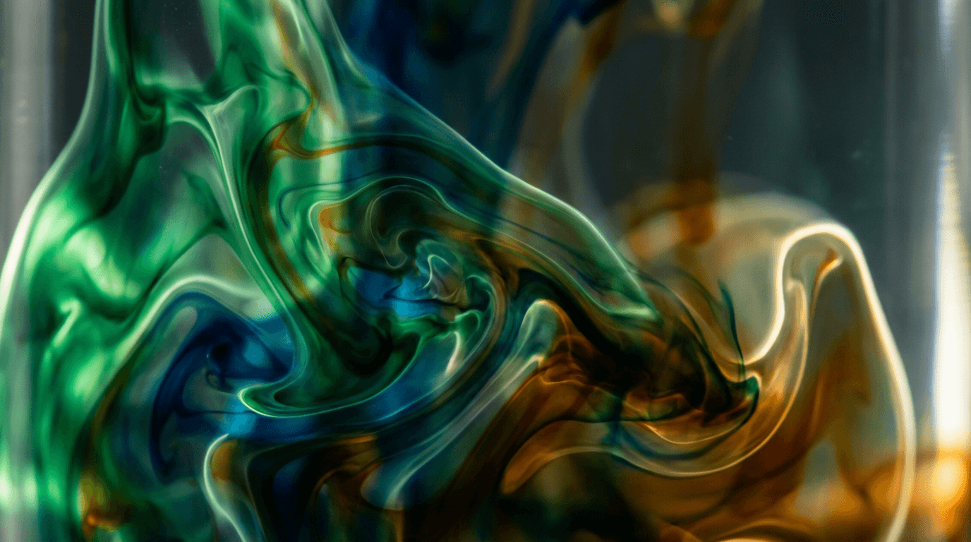 Abstract flowing liquid in jewel tones with shimmering light and organic swirling patterns